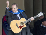 Commedian Eric Idle finishes the 2013 Whitman College commencement ceremony by singing &quot;Always Look on the Bright Side of Life&quot; on Sunday in Walla Walla.