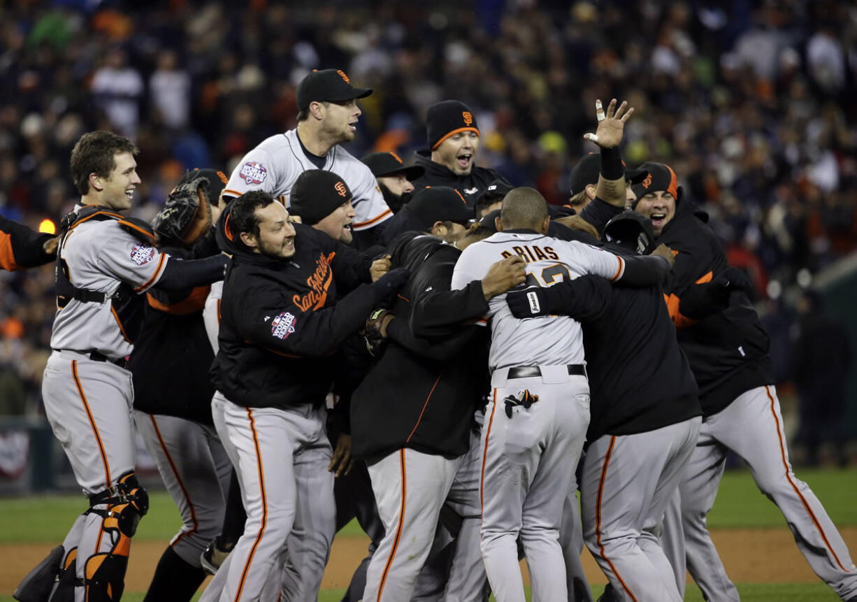 The San Francisco Giants celebrate after winning Game 4 of the World Series.