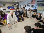 Skyview High School science teacher Mike Murray teaches freshmen physical science students about alternative fuels on June 7, 2011.