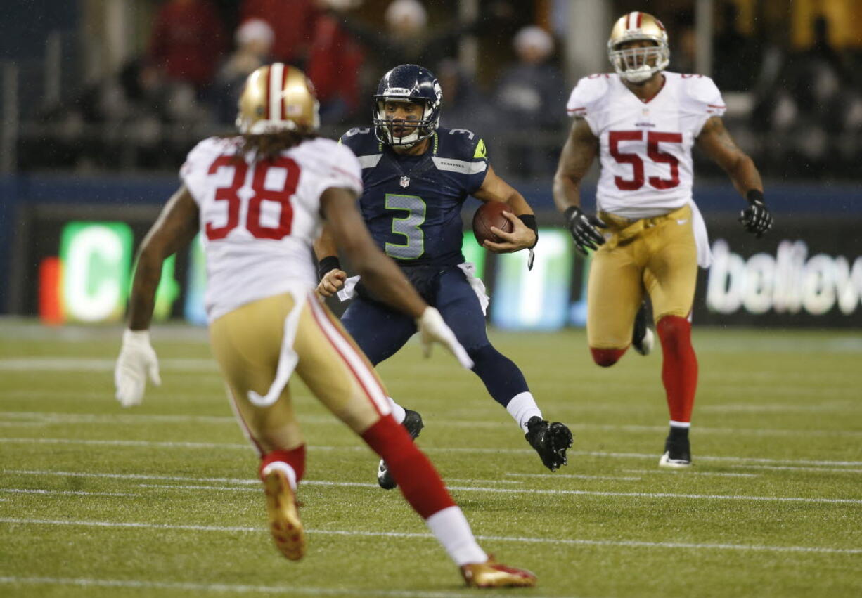 Seattle Seahawks quarterback Russell Wilson (3) in action against the San Francisco 49ers' in last December's contest, won by the Seahawks, 42-13.