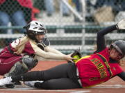 Prairie's Bailee Blechschmidt tags out Kamiakin's Hunter Schneitter for the final out in the top of the seventh inning Saturday.