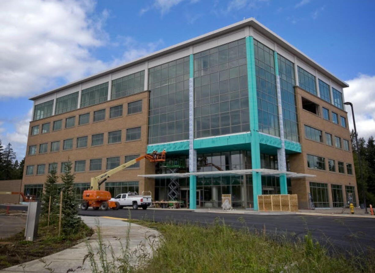 Fisher Investments CEO Ken Fisher said Monday he plans to break ground in July on a second office building, which will be able to accommodate some 700 workers on its five floors, at his Fisher Investments' campus in Camas.