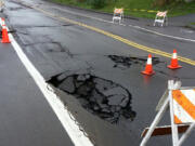 A water main break has left P Street temporarily impassable.