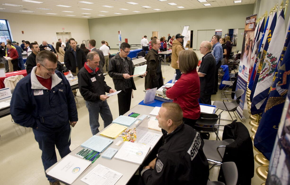 Veterans look for work at a job fair sponsored by WorkSource held at the new Armed Forces Reserve Center In Vancouver on November 17.