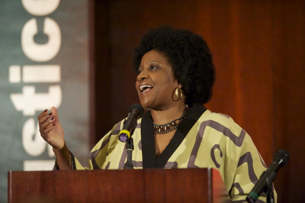 Naomi Tutu, daughter of Nobel Peace Prize laureate Desmond, speaks at the annual banquet hosted by the YWCA Wednesday at the Hilton Vancouver Washington.