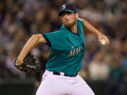 Seattle Mariners reliever Charlie Furbush delivers a pitch during the eighth inning of a game against the New York Yankees, Friday, June 7, 2013, in Seattle.