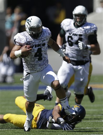 Portland State quarterback Kieran McDonagh (4) scrambles against California during the first half Saturday.