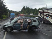 An SUV overturned in rainy conditions early Tuesday afternoon on Interstate 5 north of the East Fork Lewis River Bridge.