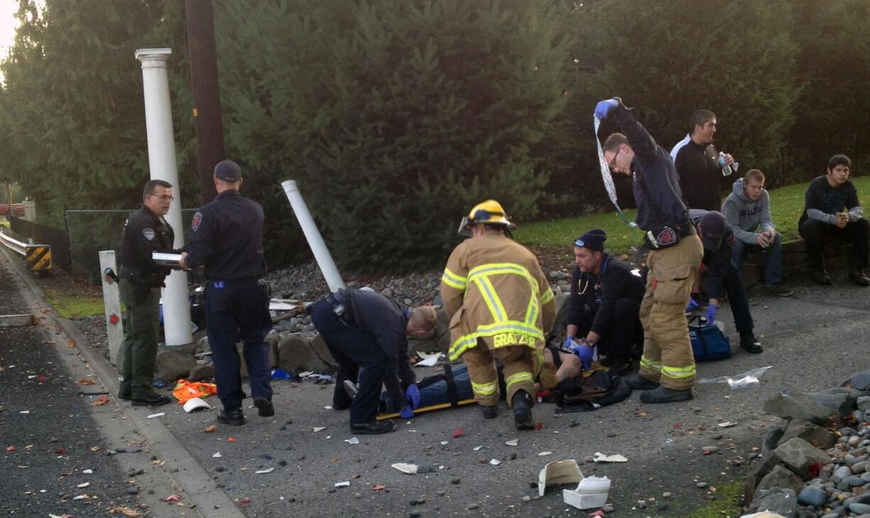 Firefighters with Clark County Fire &amp; Rescue tend to a 28-year-old man was hospitalized Thursday afternoon.