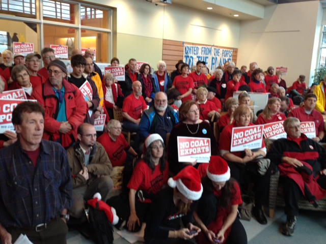 Anti-coal activists take part in a event before a hearing on a proposed coal export facility in Bellingham.