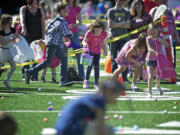 About 800 kids hunted for colorful eggs Saturday at McKenzie Stadium for the annual Easter Egg Hunt for Acceptance of All Abilities.