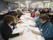 Election Officials sort through ballots at the Clark County Elections Office.