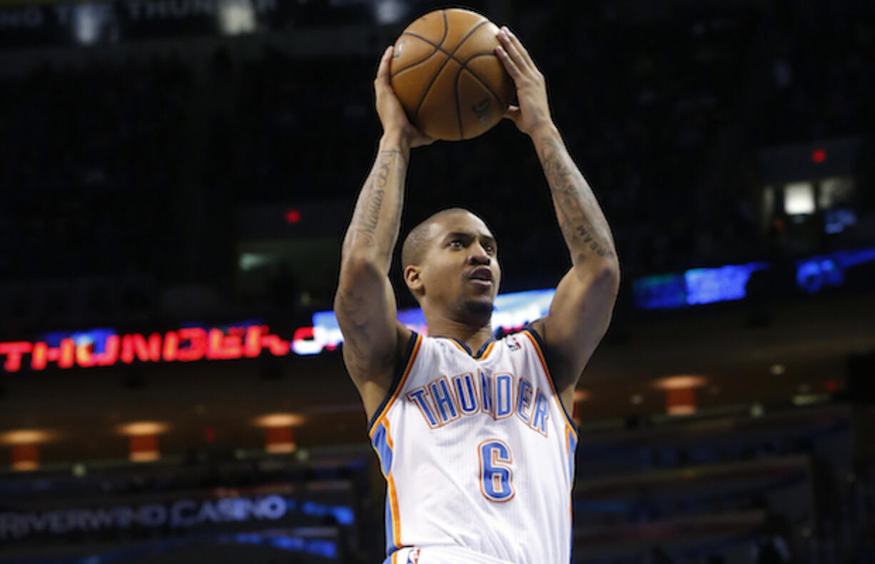 Oklahoma City Thunder guard Eric Maynor (6) shoots against the Phoenix Suns during an NBA basketball game in Oklahoma City, Friday, Feb. 8, 2013.