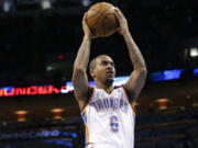 Oklahoma City Thunder guard Eric Maynor (6) shoots against the Phoenix Suns during an NBA basketball game in Oklahoma City, Friday, Feb. 8, 2013.