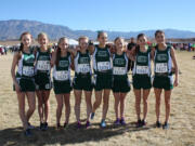 The Evergreen Storm Track Club's youth girls team pictured before the USATF Junior Olympic Cross Country National Championships.