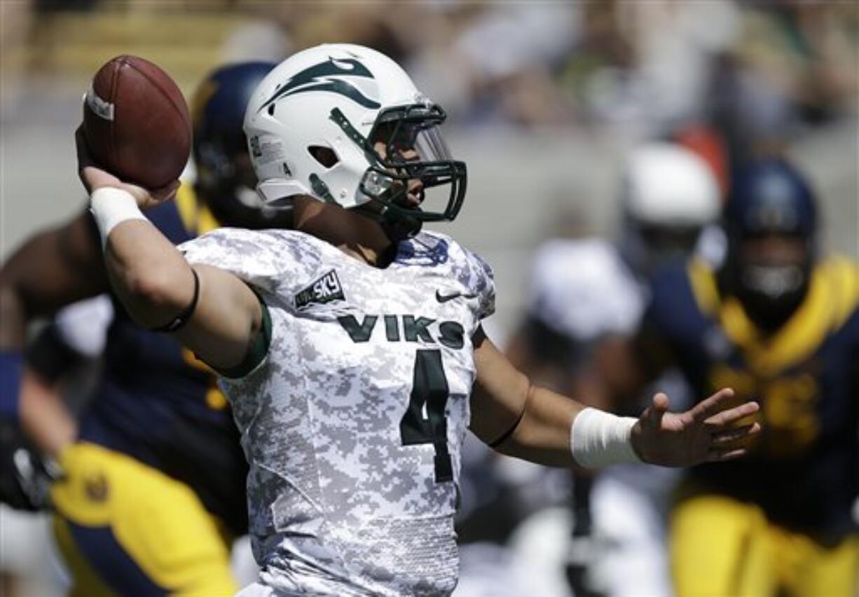 Portland State quarterback Kieran McDonagh, a Skyview High grad, passes against California during the first half Saturday.