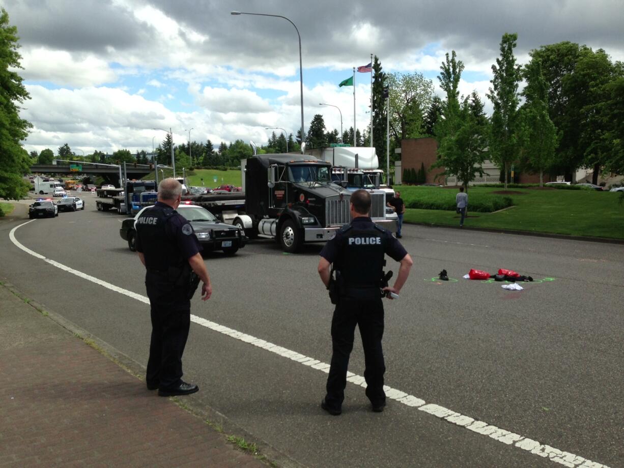 Emergency personnel are responding to a crash involving a semi-tractor trailer and a pedestrian in the 400 block of East Mill Plain Boulevard.