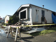 A 53 year-old woman died in a fatal house fire, seen here photographed Tuesday October 29, 2013 in Battle Ground, Washington.