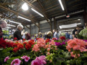 People attend the 2011 Clark Public Utilities Home and Garden Idea Fair at the Clark County Event Center, Saturday, April 30, 2011.