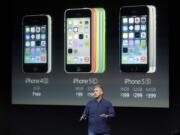 Phil Schiller, Apple's senior vice president of worldwide product marketing, speaks on stage during the introduction of the new iPhone 5c and 5s in Cupertino, Calif., Tuesday, Sept.