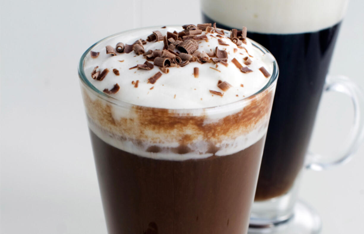 Traditional Irish coffee is served in preheated glass mugs.