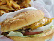 The K&amp;M burger with fries at K &amp; M Drive-In.