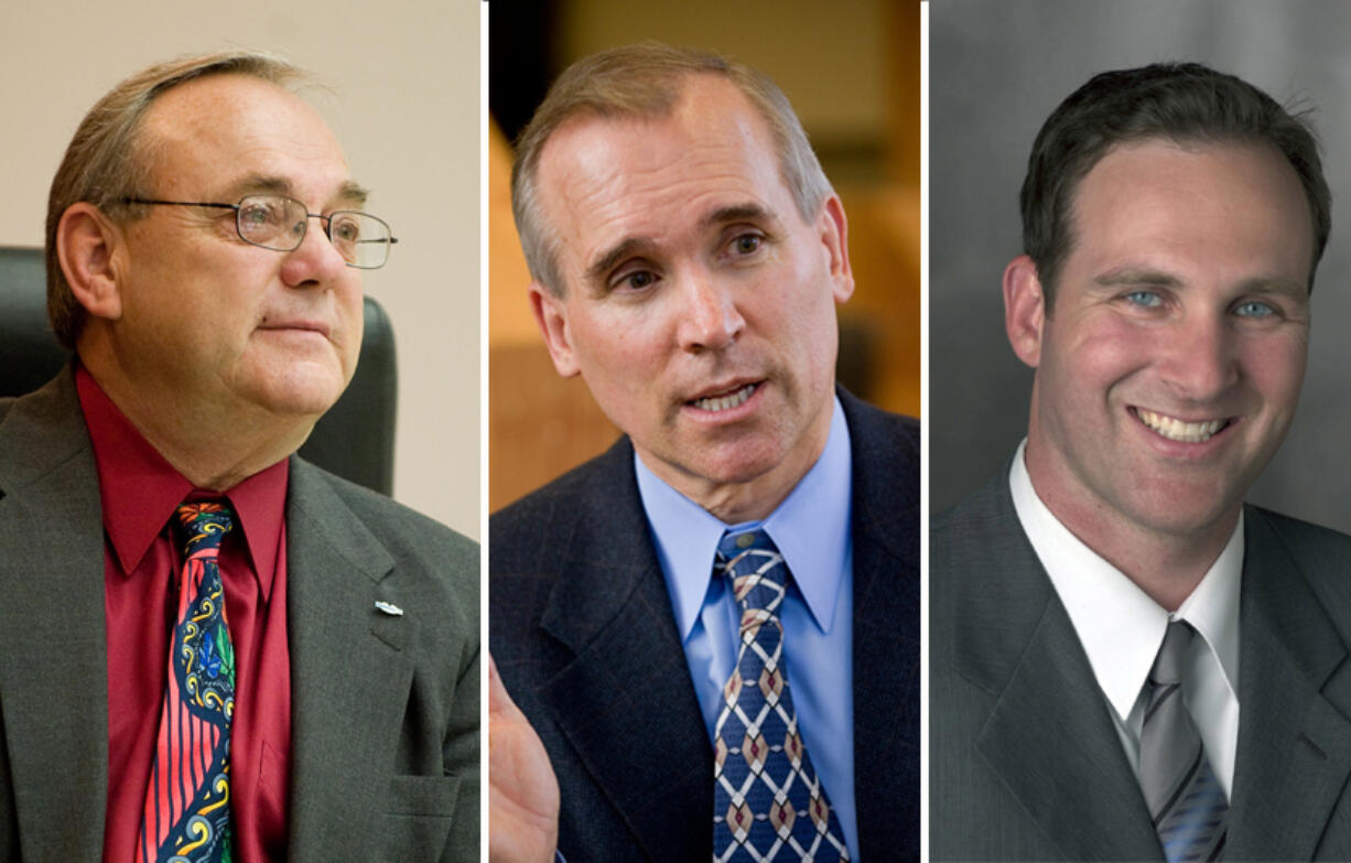 Clark County Commissioners Tom Mielke, from left, David Madore and Steve Stuart