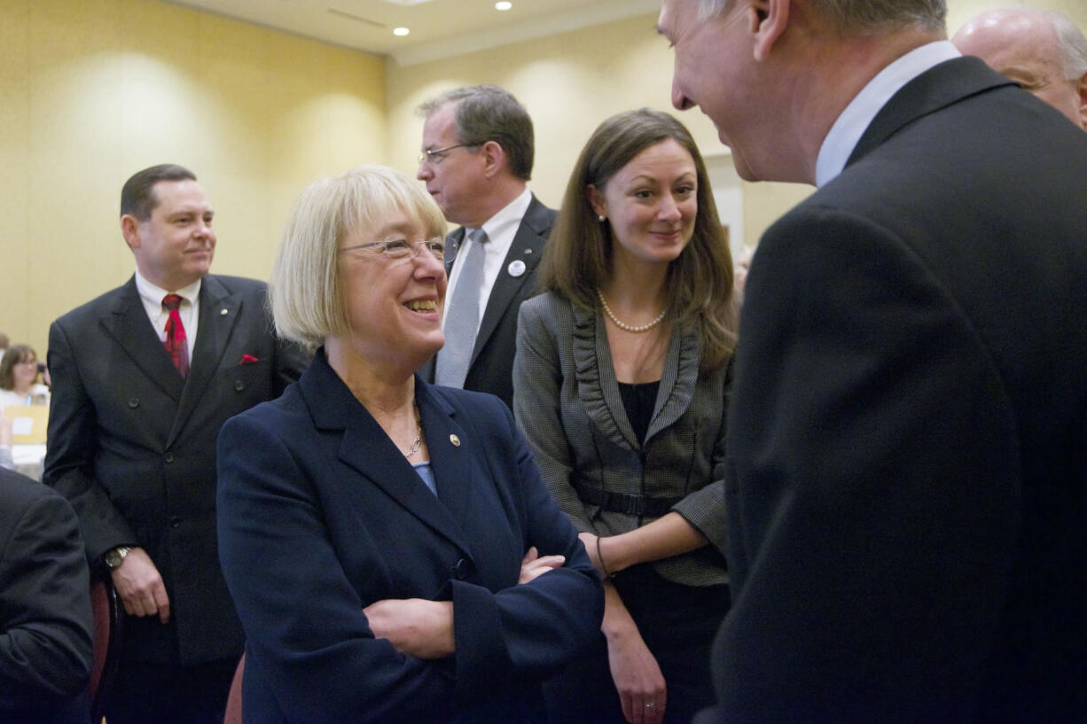 U.S. Sen. Patty Murray talks to WSUV President Mel Netzhammer, right, before  speaking at a CREDC quarterly event Thursday February 21, 2013 in Vancouver, Washington.