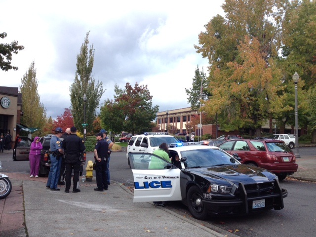 Police take witness statements after a hit-and-run accident Wednesday morning in Vancouver's Uptown Village.