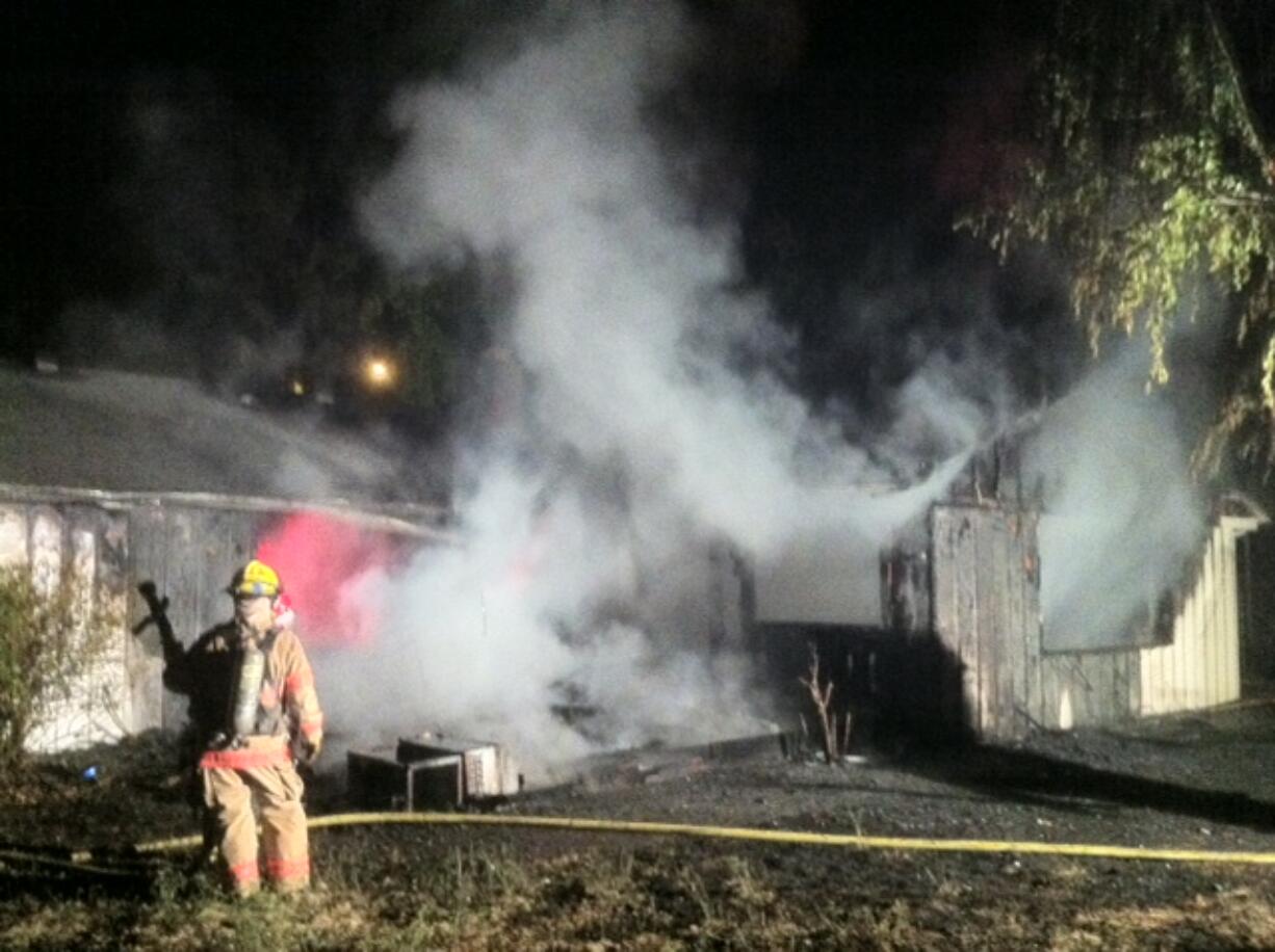 An early-morning fire charred a home in the Harney Heights neighborhood of central Vancouver Wednesday.