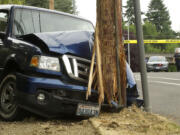 A vehicle crashed into a power pole near the intersection of East McLoughlin Boulevard and F Street, in Vancouver's Arnada neighborhood, this morning.