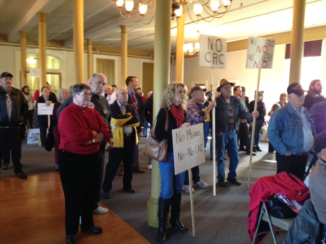 Protesters gather at The Academy in Vancouver before a demonstration against a recent C-Tran vote establishing funding for local light rail operations in connection with the Columbia River Crossing project.