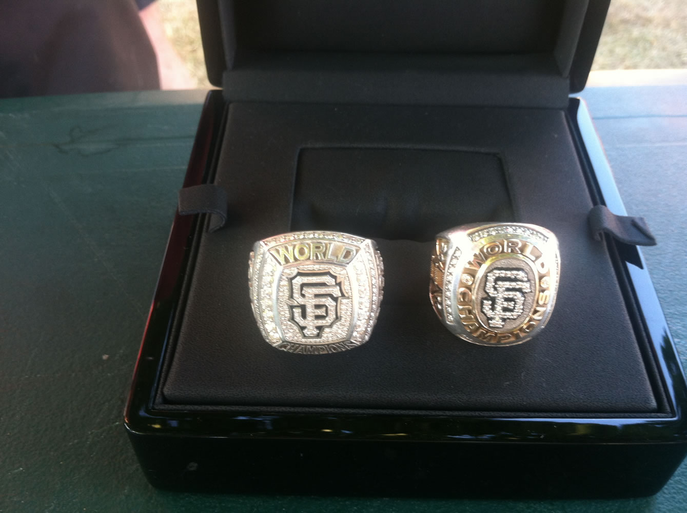 World Series rings given by the San Francisco Giants to chaplain Jeff Iorg in 2012 and 2010.