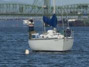 A pair of anglers tried for fall chinook salmon on Tuesday from an anchored sailboat near the Interstate 5 Bridge.