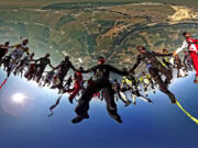 Skydivers -- 138 in all -- set a world record in Chicago in this Coca-Cola-sponsored skydive.