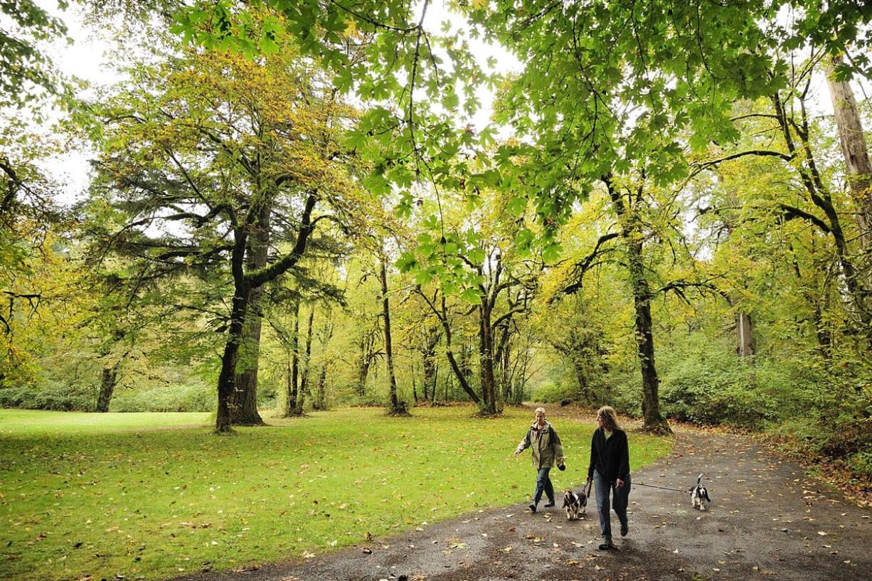 Karin Pearson-King, right, walks with friend Gudrun Spies-Seyfarth, who is visiting from Nittenau, Germany, on a path in Lewisville Park near Battle Ground. &quot;We go there to walk because it's such a beautiful place,&quot; the Vancouver woman said.