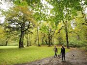 Karin Pearson-King, right, walks with friend Gudrun Spies-Seyfarth, who is visiting from Nittenau, Germany, on a path in Lewisville Park near Battle Ground. &quot;We go there to walk because it's such a beautiful place,&quot; the Vancouver woman said.