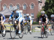 Senior Women race through downtown Vancouver during the sixth annual Courthouse Criterium bike race in 2011.