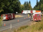 A truck tipped onto its side Wednesday morning at the Gee Creek rest area near Ridgefield.