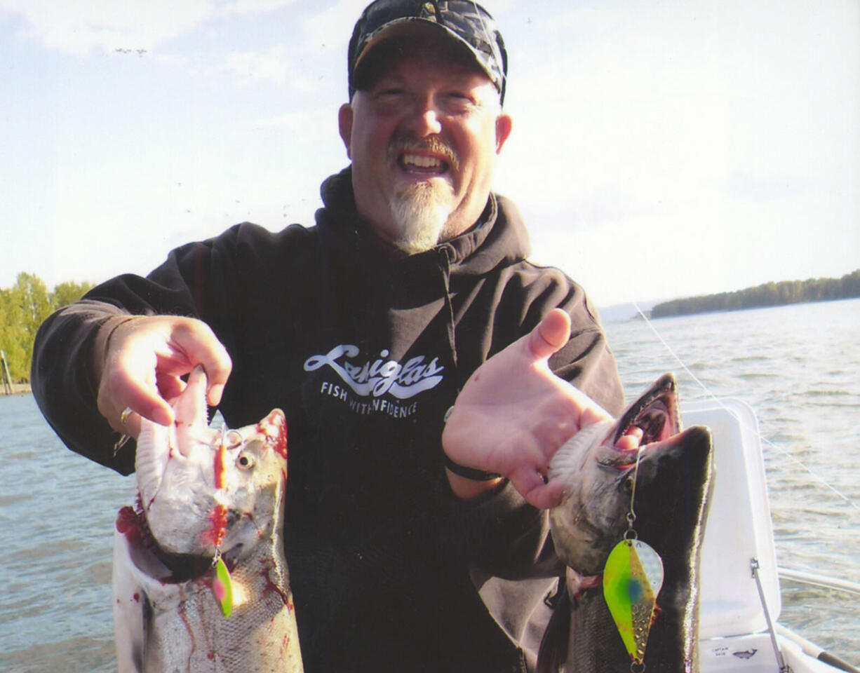 Dave Emter holds the two chinook he caught on one rod in mid-September in the Columbia River downstream of Vancouver.