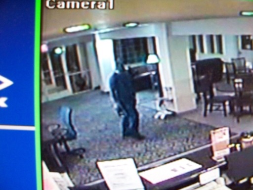 A still image from a surveillance video shows the man who robbed a Quality Inn motel in Woodland early Saturday morning.