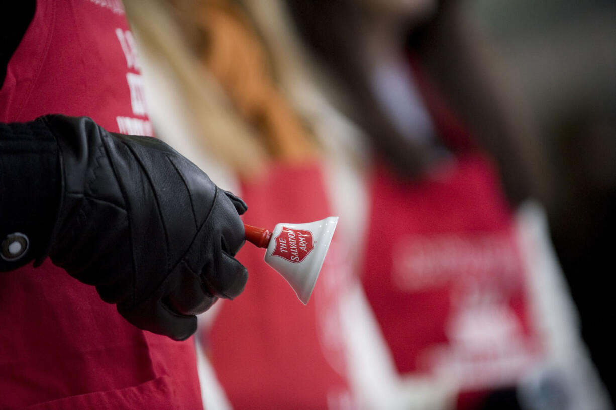 Bruce Davis rings a Salvation Army bell as he has almost every year since 1968 while volunteering in 2016.