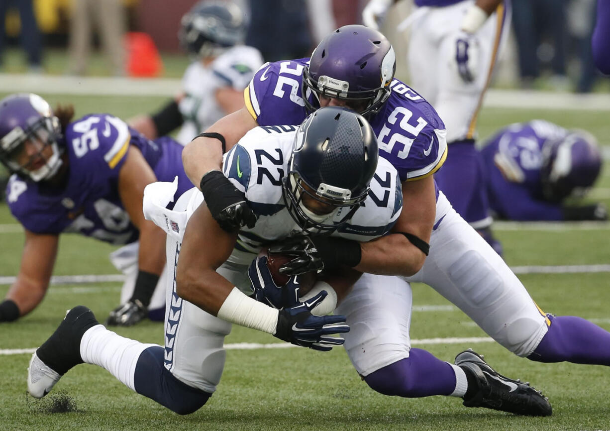 Vikings linebacker Chad Greenway (52) tackles Seahawks running back Fred Jackson (22) during the teams&#039; meeting in Minneapolis last month.