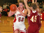 Jenka Stiasna (52) is surrounded by Prairie Falcons Saturday, at Camas High School.