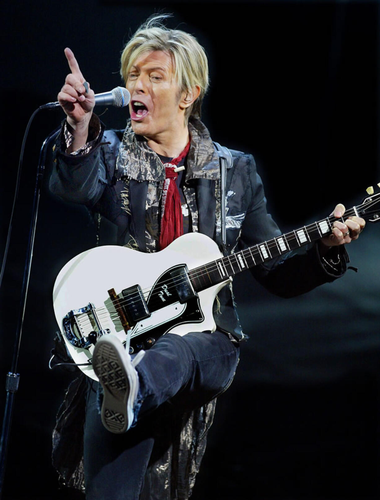 Lengendary British rock star David Bowie performs in concert on Jan. 31, 2004, at the Shrine Stadium in Los Angeles. Bowie, 69, died Sunday.