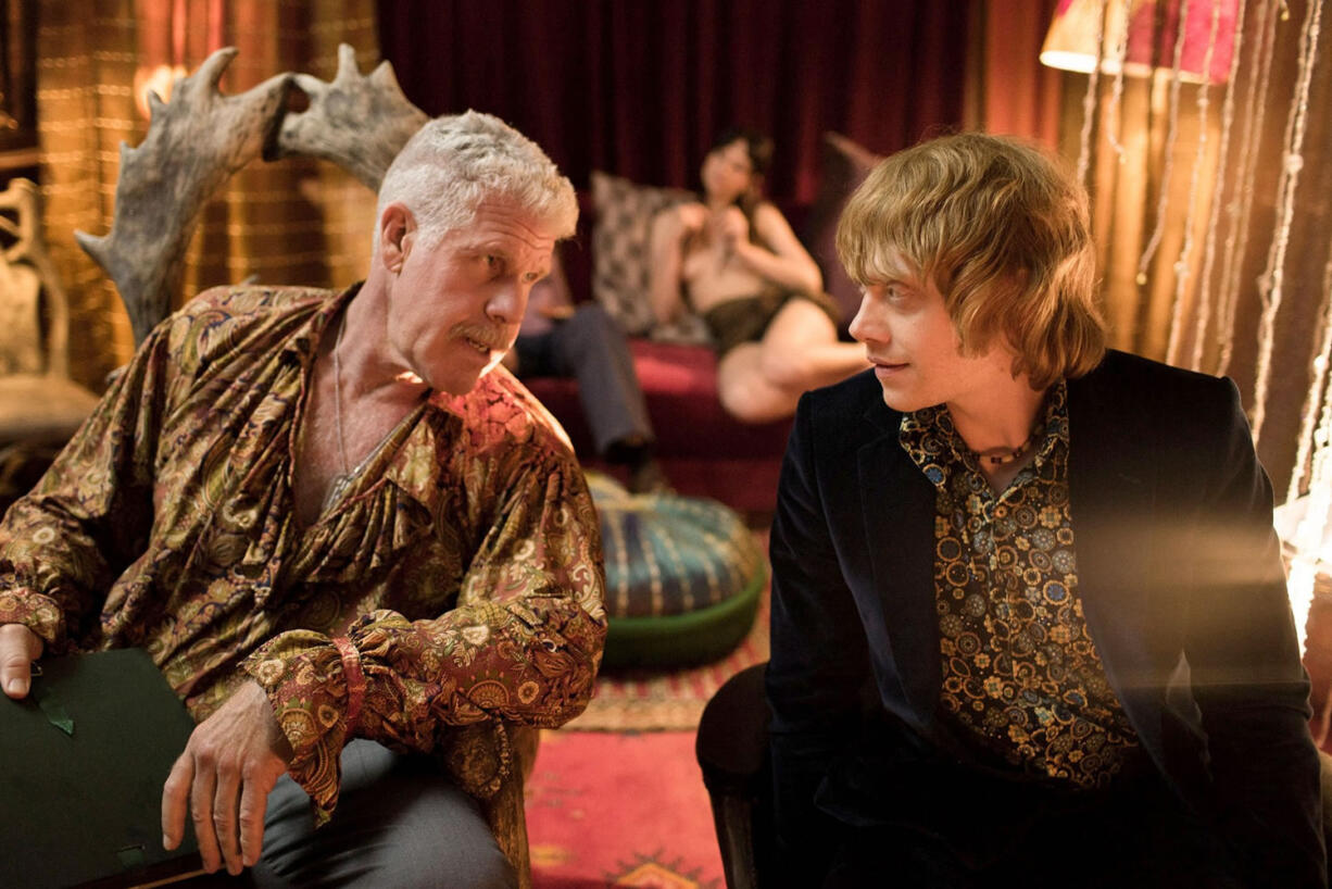 Ron Perlman, left, and Rupert Grint star in &quot;Moonwalkers.&quot; (Alchemy)