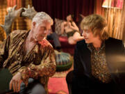 Ron Perlman, left, and Rupert Grint star in &quot;Moonwalkers.&quot; (Alchemy)