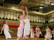 Sierra Brown shoots over the outstretched hand of a Mountain View defender during the Hoops 4 Pink game Friday, at Camas High School.