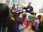 John Edmondson with the Fresno Police Chaplaincy reads to a first-grade class Jan. 15 at Pyle Elementary School in Fresno, Calif.