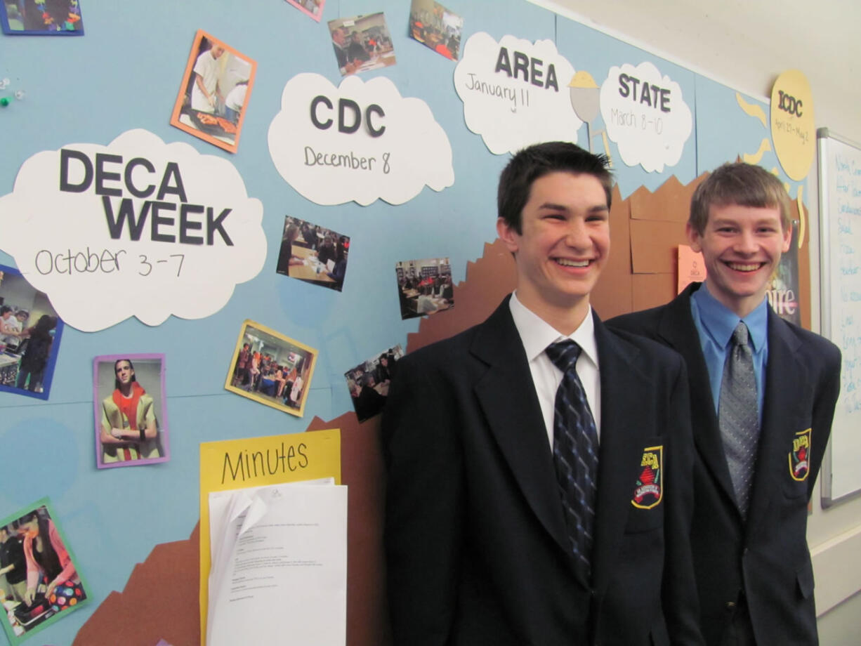 Brandon Vega (left) and Ben Hagen both &quot;double qualified,&quot; for the state DECA competition in March.